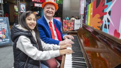 Tickle The Ivories - Eight year old Joanna with 87 year old Billy the Hat, Tickle the Ivories at Liverpool One.Picture Jason Roberts