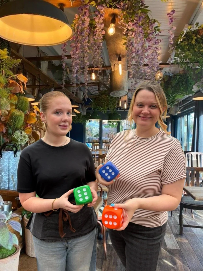 The Watering Can Roll the Dice promotion