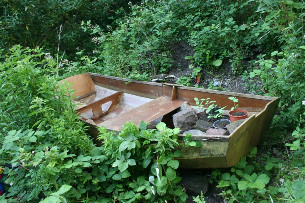 A Day in the Life in Fairfield: Urban Exploration in Liverpool 6 A Day in the Life in Fairfield - Urban Exploration in Liverpool - An old boat with some plants in