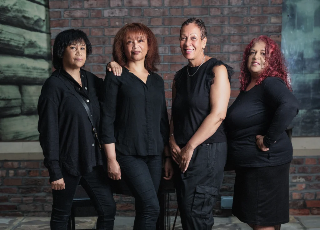 'Toxteth: The Harlem of Europe' New Exhibition To Tell The Story of Black Musicians From L8 2 At LIPA. Vocal harmony group, Distinction. Sisters Barbara and Susan Phillips, Amanda Smith, and Donna Alleyne – the first female Black British group to be signed by a major record label (EMI). Credit: Ean Flanders