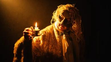 Review Ginificent's A Christmas Carol at St George's Hall - Ghost of past candle