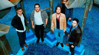 GONDOLAS band members stood looking up towards the camera